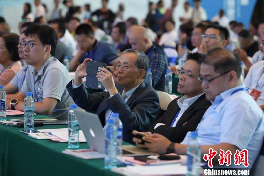 研討會現(xiàn)場圖?！■暮陚?攝