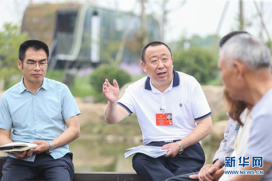 （新華全媒頭條·兩會精神看落實·圖文互動）（2）整體謀劃、系統(tǒng)升級、全面提升——落實全國兩會精神織牢織密公共衛(wèi)生防護網(wǎng)